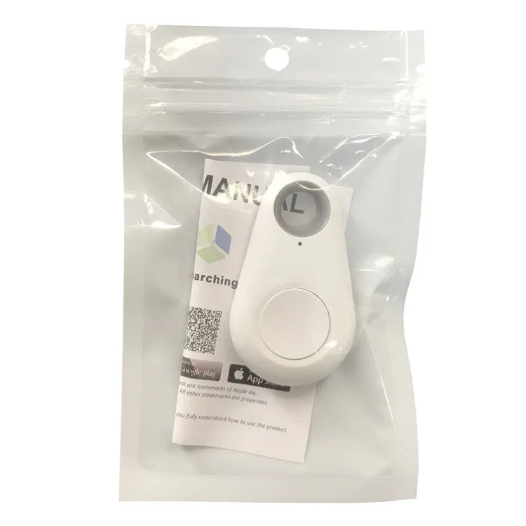 The Seamopar Mini GPS Tracker, a compact white Bluetooth Key Finder with a button, comes in a clear resealable plastic bag with a folded instruction manual visible behind the device.
