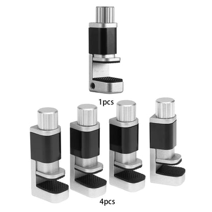 The MOJOYCE Adjustable Alloy Clamp set is ideal for accurate mobile repairs, featuring five desk clamps with a silver cylindrical handle, black center, and textured grip to securely hold objects. Perfect for precision tasks such as screen protection.