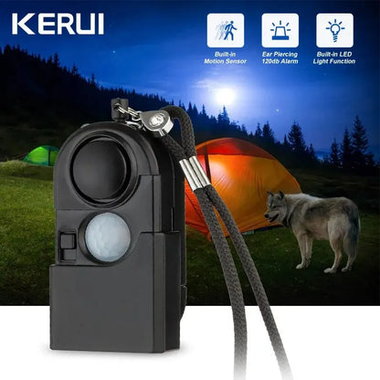 A KERUI Mini Motion Detector Alarm with lanyard is in the foreground. In the background, a wolf stands near tents under a night sky. Icons show Personal Security features: motion detection and a 120DB ear-piercing siren.