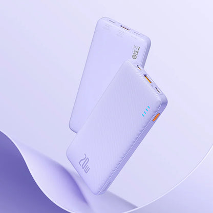 Two white Baseus Airpow 20W Power Banks, with minimalist designs, float against a light purple background. Featuring LED indicators and multiple ports, they offer fast charging with a robust 10000mAh capacity, reflecting a modern and sleek style.