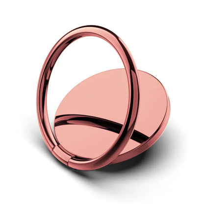 The Luxury Metal 360° Rotation Mobile Phone Ring Holder is a sleek, rose gold accessory with a circular base and swiveling ring. It attaches to the back of a smartphone, offering secure grip or stand functionality with 360° rotation.