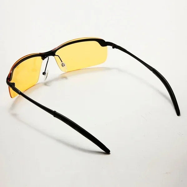 HARKO Polarized Night Vision Cycling Sunglasses feature yellow-tinted lenses, black frames, and rubberized earpieces for outdoor adventures, enhancing visibility. Displayed on a white background.