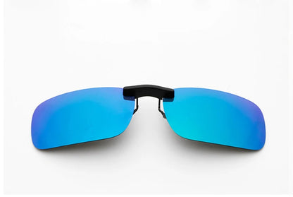The Honey Joe Polarized Clip-On Sunglasses feature rimless, mirrored blue lenses on a white background, offering UV400 protection and a black nose bridge that elegantly connects the lenses.