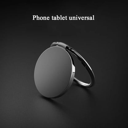 The Luxury Metal 360° Rotation Mobile Phone Ring Holder is a sleek, black, round accessory with a metal finish. It offers full 360° rotation and features a magnetic function. Displayed against a dark background, it perfectly complements any phone or tablet.