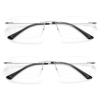 Two pairs of YINSQER Titanium Rimless Reading Glasses - Blue Light Blocking, featuring thin silver bridges and black temple tips, are displayed from a top-down view against a white background.