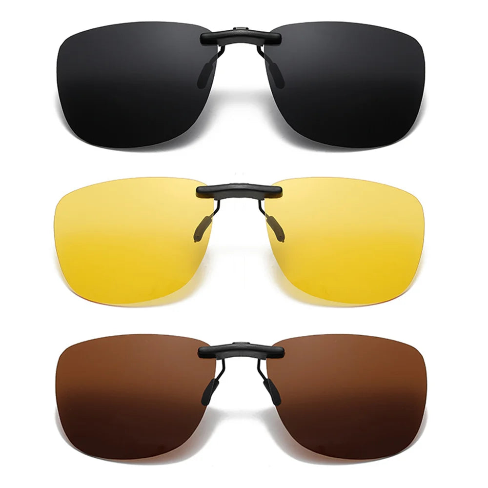 The Polarized Clip-On Sunglasses - UV400 Anti-Glare Protection are displayed in three styles: dark, yellow, and brown lenses. They feature a sleek rectangular design with black clips and offer full UV400 protection.