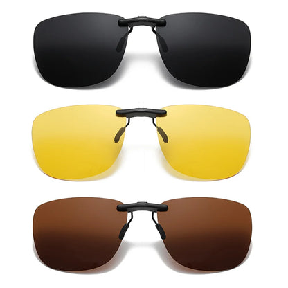The Polarized Clip-On Sunglasses - UV400 Anti-Glare Protection are displayed in three styles: dark, yellow, and brown lenses. They feature a sleek rectangular design with black clips and offer full UV400 protection.