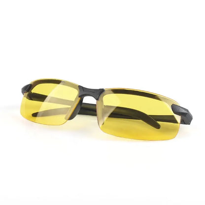 The HARKO Polarized Night Vision Cycling Sunglasses, featuring yellow-tinted lenses and black frames with a wraparound design, are showcased on a plain white background. Perfect for outdoor adventures.