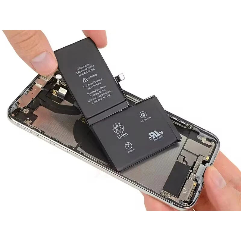 A person is handling an iPhone SE with its circuits exposed, inserting an XDOU Battery for iPhone SE 5-11 Pro. The Li-ion markings and safety symbols highlight the need for careful handling to ensure optimal battery life.