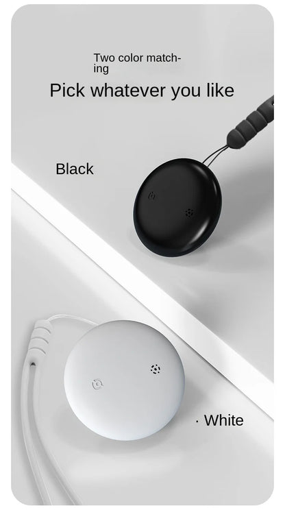 Two circular devices appear, one black and one white, connected by cables on a white background. Text reads: Two color matching. Pick whatever you like. Black. White. Now with NoEnName GPS Smart Tracker capabilities to easily locate things or pets via the Bluetooth Locator for Pets.