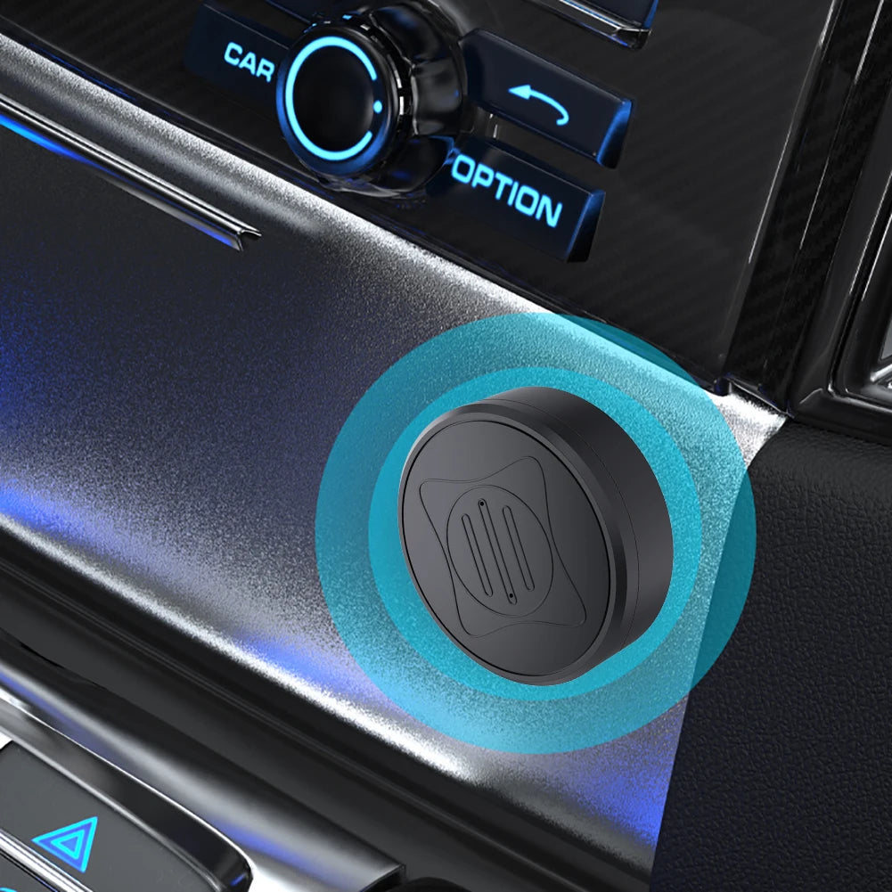 Close-up of a car dashboard featuring a round, black button with an embossed phone icon and blue light ring. Nearby controls labeled CAR and OPTION discreetly integrate the Mini GPS Tracker - Real-Time Magnetic Smart Locator for enhanced safety alerts.