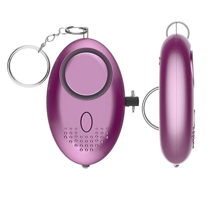 The 130dB Personal Safety Alarm Keychain is shown from two angles, displaying a large button, speaker holes, and a keychain loop. This compact device emits a powerful alert to ensure personal safety when activated.