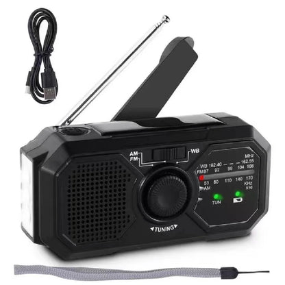 The Sayin Portable Solar Radio with Power Bank & Flashlight, an essential emergency tool, includes a tuning dial, solar panel, antenna, AM/FM/weather bands with frequency display. It comes in black with a USB charging cable and wrist strap.