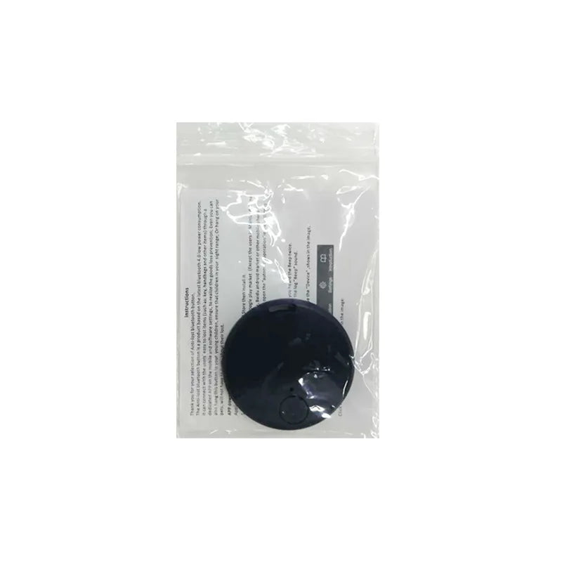 A Seamopar Mini GPS Tracker, compact and black, rests on a clear plastic bag containing a folded instruction paper in a single-column format with predominantly black text highlighted in grey.