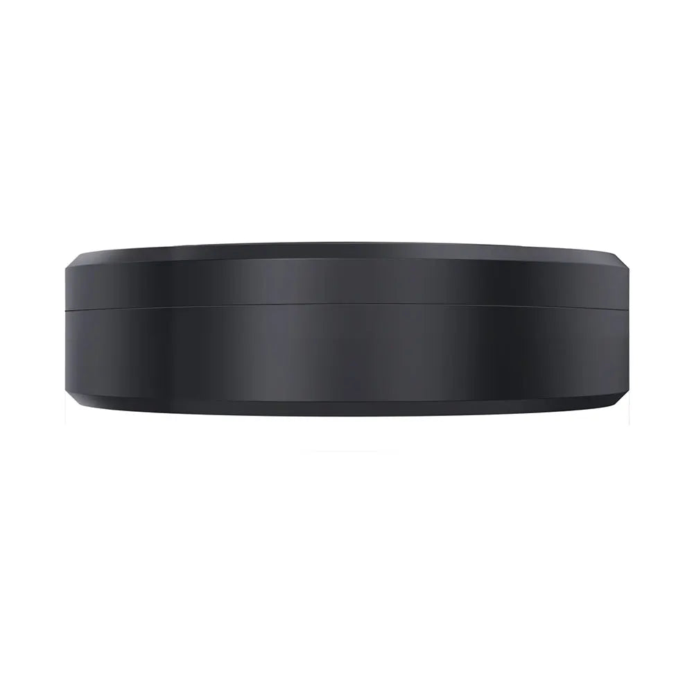 Viewed from the side, the sleek, smooth, and minimalist design of a black, round Mini GPS Tracker - Real-Time Magnetic Smart Locator has no visible buttons or features. Its streamlined appearance is highlighted by lighting against a plain white background.
