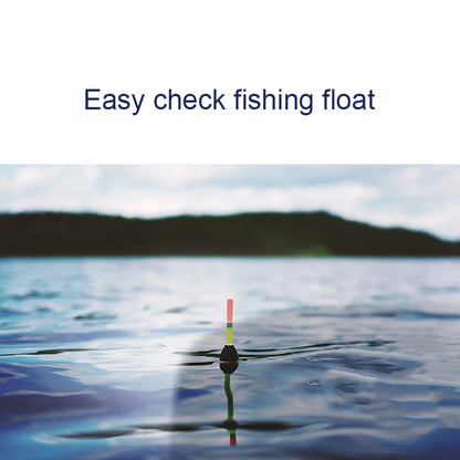 A colorful fishing float bobs on a calm lake, visible under the cloudy sky. The text Easy Check Fishing Float appears clearly without glare, akin to clarity offered by Polarized Clip-On Sunglasses - UV400 Anti-Glare Protection. Meanwhile, the shoreline looms in the distance.