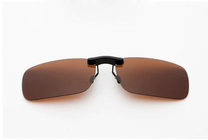 The Honey Joe Polarized Clip-On Sunglasses feature rimless, rectangular brown lenses, a sleek black bridge, and offer UV400 protection against a pristine white background.