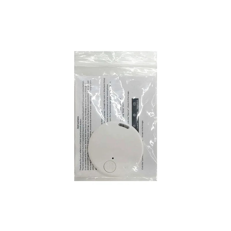 The Seamopar Mini GPS Tracker, a white, round key finder, is nestled in transparent plastic packaging with visible instructions on white paper and an included battery. Featuring a small button, it promises to be your go-to anti-theft alert device.