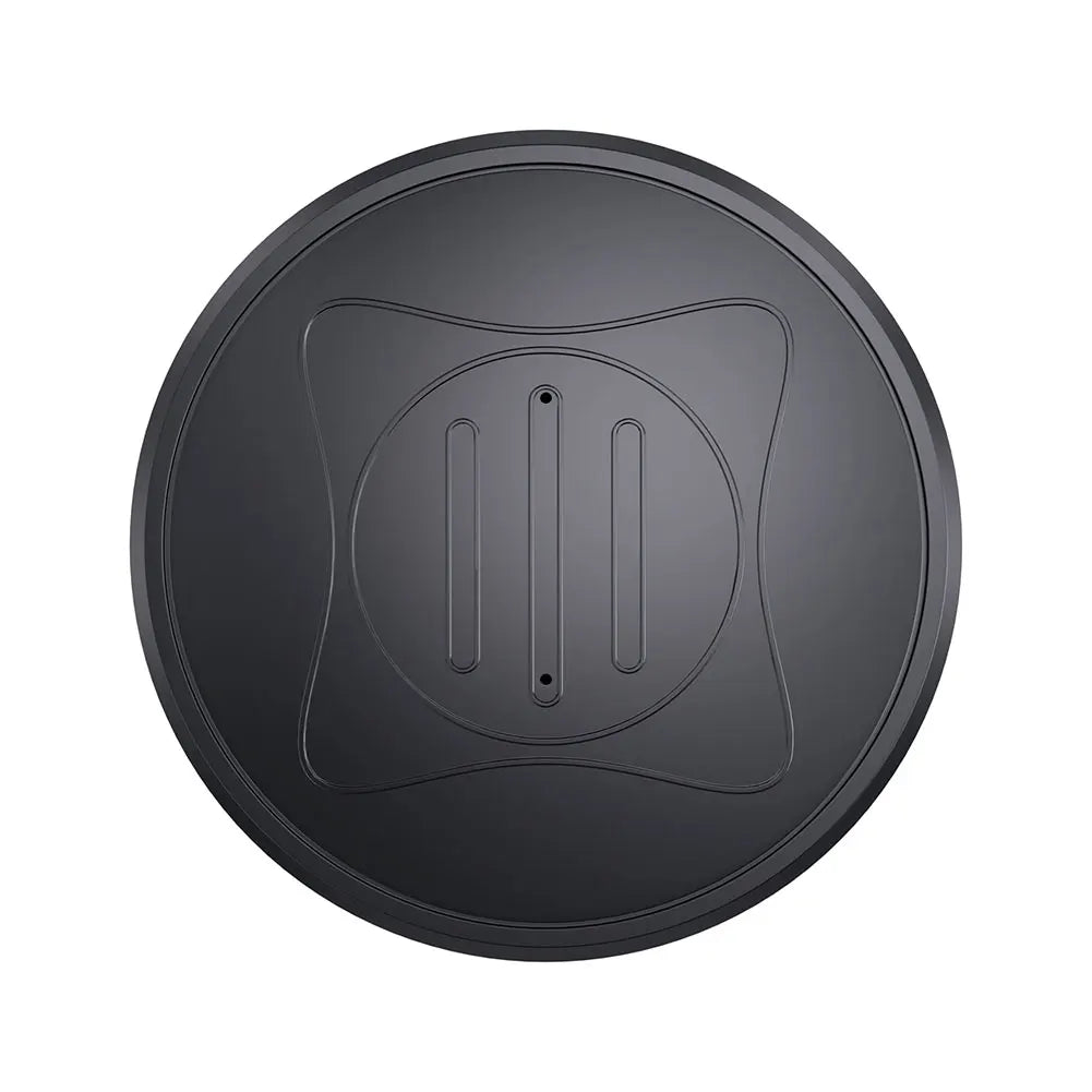 A round black plastic manhole cover with a central square design and two elongated grooves with bolt holes is set on a white background. Installed for efficient underground system monitoring, it includes the Mini GPS Tracker - Real-Time Magnetic Smart Locator for safety alerts and tracking.