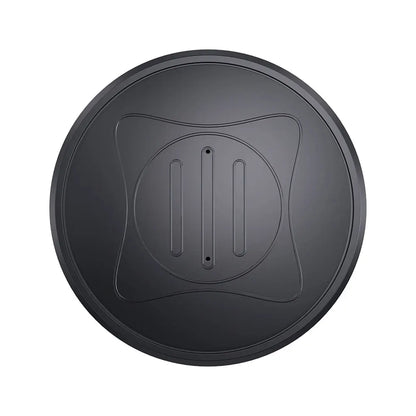 A round black plastic manhole cover with a central square design and two elongated grooves with bolt holes is set on a white background. Installed for efficient underground system monitoring, it includes the Mini GPS Tracker - Real-Time Magnetic Smart Locator for safety alerts and tracking.
